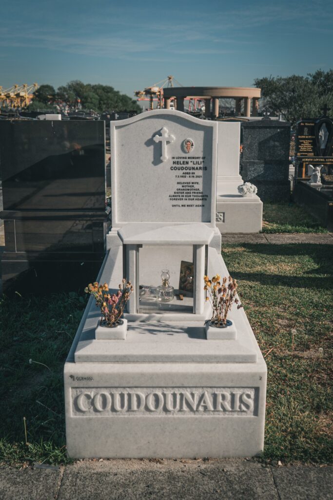 Single white stone burial monument